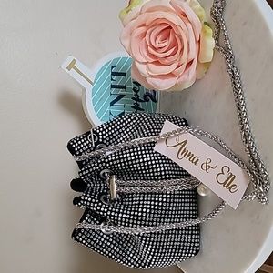 Anna & Elle faux pearl studded bucket bag.